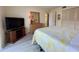 Bedroom with a TV, dresser and mirror, and closet at 3500 El Conquistador Pkwy # 347, Bradenton, FL 34210