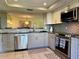 Updated kitchen boasts modern appliances, elegant countertops, and an open design perfect for entertaining guests at 3500 El Conquistador Pkwy # 347, Bradenton, FL 34210
