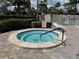 Relax in this charming tiled in-ground spa with beautiful landscaping and easy access at 3500 El Conquistador Pkwy # 347, Bradenton, FL 34210
