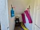 Storage area with grill, pool noodles and pink equipment bags at 3500 El Conquistador Pkwy # 347, Bradenton, FL 34210