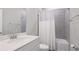 Clean bathroom with a modern vanity, sink, and a shower with a curtain at 3504 Big Sky Way, Bradenton, FL 34211