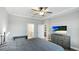 Inviting bedroom with en suite bathroom access, dresser and neutral decor at 3504 Big Sky Way, Bradenton, FL 34211