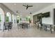Inviting outdoor kitchen with bar seating, perfect for entertaining guests at 3504 Big Sky Way, Bradenton, FL 34211