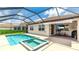 Screened-in pool and patio area offers a relaxing outdoor space at 3504 Big Sky Way, Bradenton, FL 34211