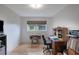 Bedroom with desk, wooden floors, and a view of the outside at 3621 S Lockwood Ridge Rd, Sarasota, FL 34239