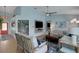 Inviting living room featuring shiplap walls, comfortable seating, and an open layout at 4120 51St W Dr, Bradenton, FL 34210