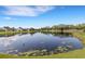 Beautiful pond provides scenic views to nearby homes at 4120 51St W Dr, Bradenton, FL 34210