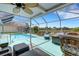 Enjoy the serene atmosphere of a screened pool and patio overlooking the water at 4120 51St W Dr, Bradenton, FL 34210