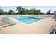 Community pool with comfortable seating and clear, refreshing water for residents to enjoy at 4194 Banbury Cir, Parrish, FL 34219