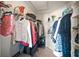 Well-organized walk-in closet with ample shelving and hanging space, offering plenty of storage solutions at 4194 Banbury Cir, Parrish, FL 34219