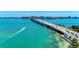 Expansive aerial shot of a bridge over turquoise water with city skyline in the distance on a bright day at 4227 Placid Dr, Sarasota, FL 34243