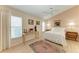 Comfortable bedroom with soft lighting, a decorative rug, and neutral décor at 4227 Placid Dr, Sarasota, FL 34243
