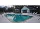 Beautiful community pool area complete with a lounging area and access to a cabana for outdoor relaxation at 4227 Placid Dr, Sarasota, FL 34243