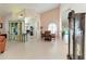Open-concept living area with tall ceilings, tile floors, and abundant natural light at 4227 Placid Dr, Sarasota, FL 34243