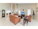 Expansive living room with vaulted ceilings, tile floors, and comfortable seating arrangements at 4227 Placid Dr, Sarasota, FL 34243