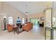 Inviting living room with comfortable seating, high ceilings, and scenic outdoor views at 4227 Placid Dr, Sarasota, FL 34243