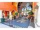 Exterior view of a vibrant market entrance with colorful decorations, fresh produce, and inviting displays at 4227 Placid Dr, Sarasota, FL 34243