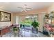 Sunroom with sliding glass doors leading to backyard at 4227 Placid Dr, Sarasota, FL 34243