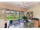 Sunroom with sliding glass doors leading to back yard at 4227 Placid Dr, Sarasota, FL 34243