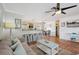 Open living space featuring tile flooring, comfortable seating, and a view of the kitchen at 4303 83Rd W St, Bradenton, FL 34209
