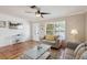 Inviting living room with tile floors, stylish decor, and plenty of natural light at 4303 83Rd W St, Bradenton, FL 34209