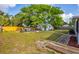 Spacious backyard with lush greenery and outdoor dining area at 4528 58Th W St, Bradenton, FL 34210
