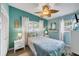 Inviting bedroom with charming coastal décor and natural lighting at 4528 58Th W St, Bradenton, FL 34210