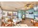 Inviting sunroom with tile floors, comfortable seating, and natural light at 4528 58Th W St, Bradenton, FL 34210