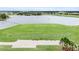 Aerial view of community lake and golf course driving range at 4720 Arpino Ct, Bradenton, FL 34211