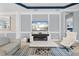 Inviting living room with a sleek fireplace, stylish furnishings, and neutral decor for a relaxing atmosphere at 4720 Arpino Ct, Bradenton, FL 34211