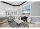 Comfortable living space with a contemporary design, featuring recessed lighting and views of the dining area at 4720 Arpino Ct, Bradenton, FL 34211