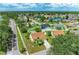 Aerial view of residential area with neighborhood homes and nearby lakes at 4811 14Th E Ave, Bradenton, FL 34208