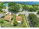 Aerial view of property with well-maintained yard and neighborhood with water access at 4811 14Th E Ave, Bradenton, FL 34208