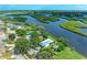 Aerial view of community amenities with neighborhood pool, tennis courts, and water access at 4811 14Th E Ave, Bradenton, FL 34208