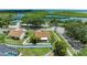 Aerial view of property and surrounding neighborhood, with nearby water views at 4811 14Th E Ave, Bradenton, FL 34208