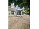 Outdoor patio with brick pavers and a screened in lanai overlooking the backyard at 4811 14Th E Ave, Bradenton, FL 34208