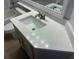 Bathroom showcasing quartz countertops, white cabinets, and modern fixtures at 4811 14Th E Ave, Bradenton, FL 34208