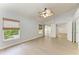 Bright bedroom with large windows, closet and sliding doors at 4811 14Th E Ave, Bradenton, FL 34208