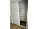 Spacious closet with sliding doors and multiple wire shelves for optimal storage organization at 4811 14Th E Ave, Bradenton, FL 34208