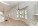 This eat-in kitchen features an abundance of natural light, sleek countertops and stainless steel appliances at 4811 14Th E Ave, Bradenton, FL 34208