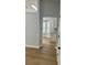 Inviting entryway with light-colored walls and wood-look floors leads to the kitchen at 4811 14Th E Ave, Bradenton, FL 34208