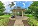 A beautifully designed gazebo featuring classic columns offers a peaceful outdoor space for relaxation and gatherings at 4811 14Th E Ave, Bradenton, FL 34208