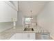 Granite countertops, white cabinets, and stainless dishwasher feature in this bright kitchen setup at 4811 14Th E Ave, Bradenton, FL 34208