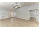Open living space featuring neutral paint, modern flooring, and a clear view to the foyer and entryway at 4811 14Th E Ave, Bradenton, FL 34208