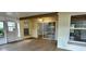 Inviting living room with wood floors, sliding glass doors, and access to the outdoors at 4811 14Th E Ave, Bradenton, FL 34208