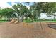A charming playground with slides and swings set within a community, inviting children to play in a safe and fun environment at 4811 14Th E Ave, Bradenton, FL 34208