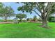 A picturesque playground with swings, slide, and gazebo offers families an inviting and playful outdoor space at 4811 14Th E Ave, Bradenton, FL 34208
