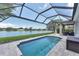 The inviting pool and spa area offers picturesque views of the tranquil lake at 5142 51St W Ln, Bradenton, FL 34210