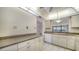 Kitchen with granite countertops, tile flooring, view of second living space at 5255 Lake Village Dr # 40, Sarasota, FL 34235