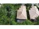 Aerial view displays properties with well-manicured lawns and enclosed patios, perfect for relaxing and enjoying the outdoors at 6744 Hickory Hammock Cir, Bradenton, FL 34202